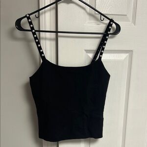 A. Black Sleeveless Top with Studded Straps